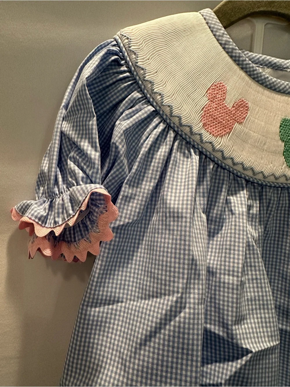 Blue Gingham Smocked Top with Pink Leggings with Matching Bow.